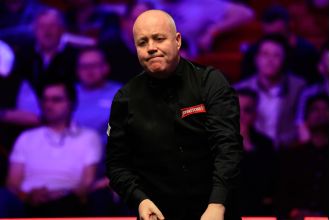 Snooker player John Higgins suggests he may retire after losing in the Tour Championship.