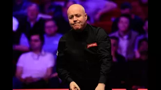 Snooker player John Higgins suggests he may retire after losing in the Tour Championship.