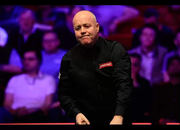 Snooker player John Higgins suggests he may retire after losing in the Tour Championship.