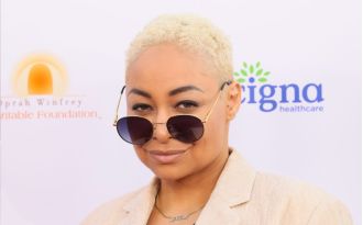 Raven-Symoné clarifies her controversial statement about not identifying as African American, saying she was simply misunderstood.