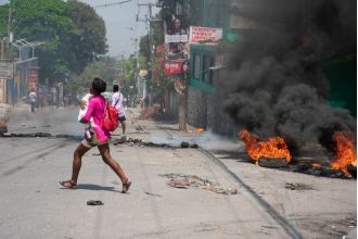 Americans in Haiti are facing challenges in escaping the current surge in gang violence.