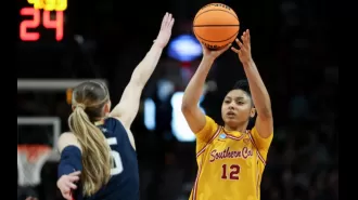 Freshman basketball star JuJu Watkins of USC breaks record for highest-scoring NCAA women's freshman player.