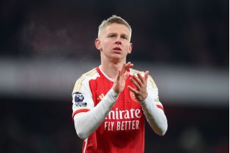 Ukraine's Zinchenko of Arsenal is ready for battle, showing loyalty to his country.