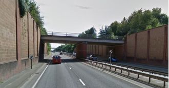 A woman passed away after falling from a bridge onto a road.