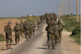 Israel mostly withdraws soldiers from South Gaza, effectively ending an 11-day offensive against Hamas.