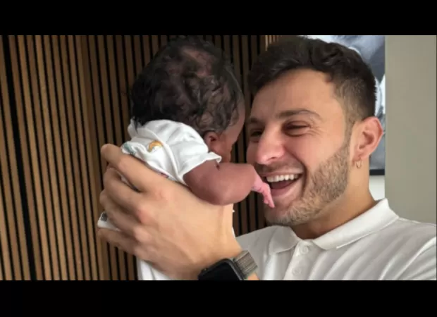 A celebrity from Strictly wins over fans by introducing her previous partner to her new baby.