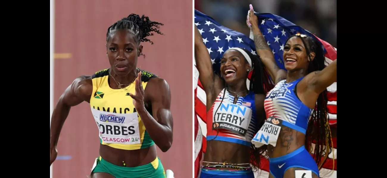 American runners help a hurt Jamaican sprinter at the USA vs. Jamaica track meet.