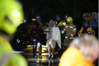 Hundreds of residents evacuated after river overflows its banks.