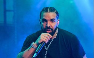 Drake keeps giving fans gifts on tour, now offering to pay for someone's divorce.