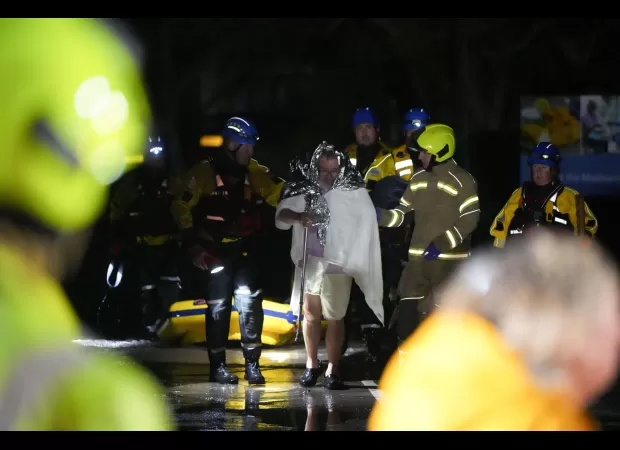 Hundreds of residents evacuated after river overflows its banks.