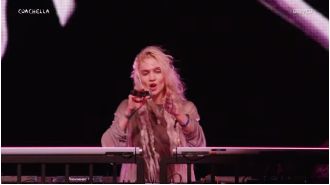 Singer screams during Coachella performance due to technical issues.