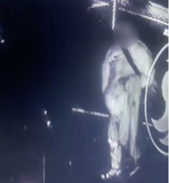 Person smears feces at restaurant and on pedestrian crossing buttons.