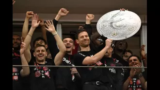 Xabi Alonso and former Arsenal leader Granit Xhaka celebrate Bayer Leverkusen's first Bundesliga win.