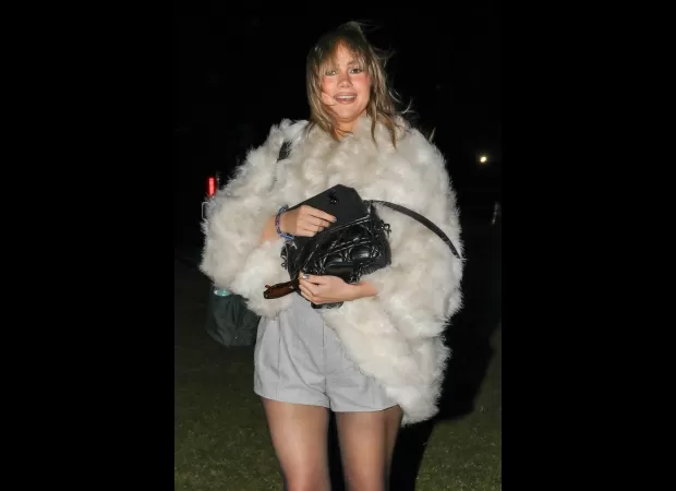 Suki Waterhouse announces baby's gender at emotional Coachella show.