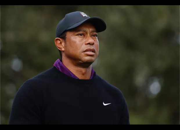 Tiger Woods achieves record with 24th consecutive Masters appearance.