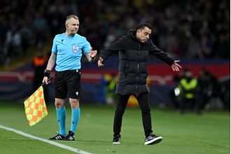 Xavi accuses referee for Barcelona's Champions League defeat.