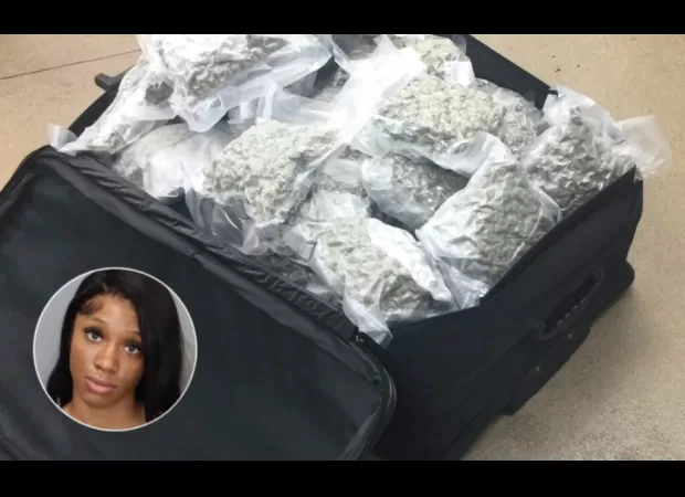 A woman was arrested at Memphis airport for carrying 56 pounds of ganja.