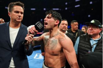 Ryan Garcia claims victory over Devin Haney in New York, challenging anyone who doubted him.