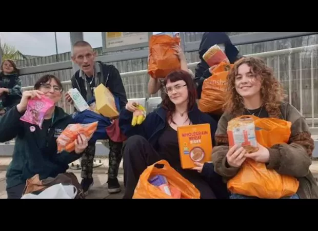 A group of people are stealing from stores and giving the food to those in need, known as 