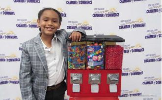A child CEO runs a lemonade stand and charity organization at only 8 years old.