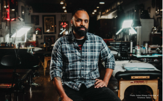Black tattoo parlor prioritizes giving back in business model.