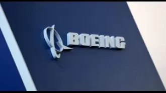 Boeing reports significant loss of $355 million in efforts to overcome recent crisis.