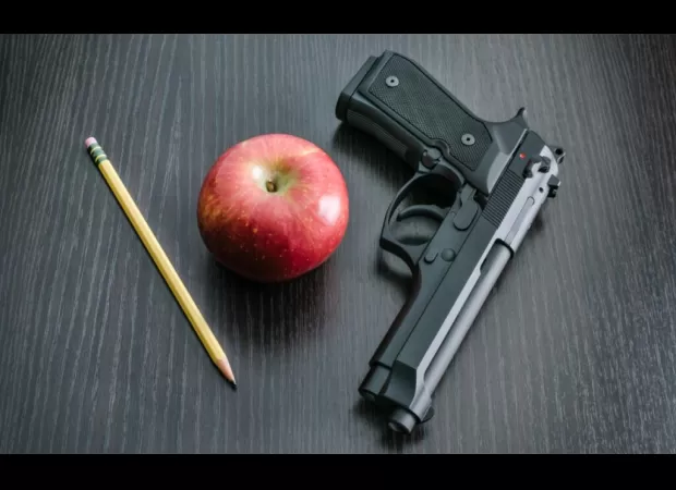 Tennessee House approves law allowing teachers to carry guns.