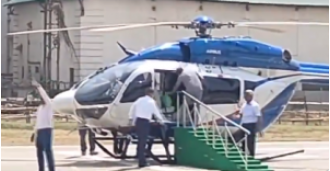 Mamata Banerjee stumbles while getting on helicopter.