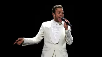 Olly Murs feels guilty for leaving his wife to care for their newborn daughter while he's away on tour.