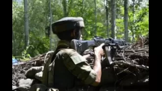 One person dies and three are wounded during a conflict between volunteer groups from different villages in Manipur.