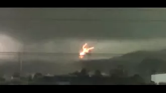 Deadly tornado strikes, killing five and taking down powerline in a single moment.