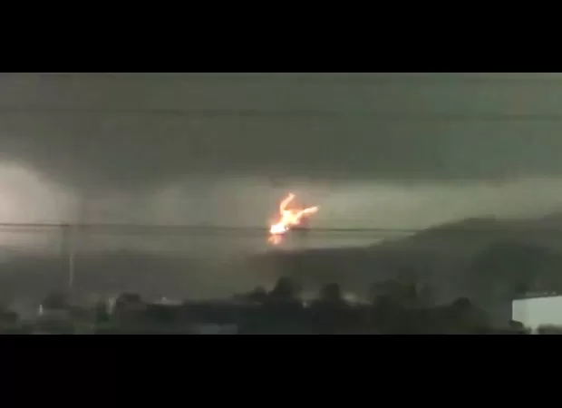 Deadly tornado strikes, killing five and taking down powerline in a single moment.
