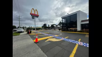A person is in critical condition after being stabbed outside a McDonald's in Melbourne.