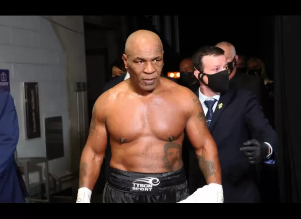 Mike Tyson is cutting out cannabis and sex to focus on his upcoming fight against Jake Paul. He's fully committed to training like he loves it.