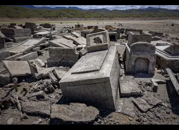 A 300-year-old village resurfaces from a dried-up reservoir during a period of drought.