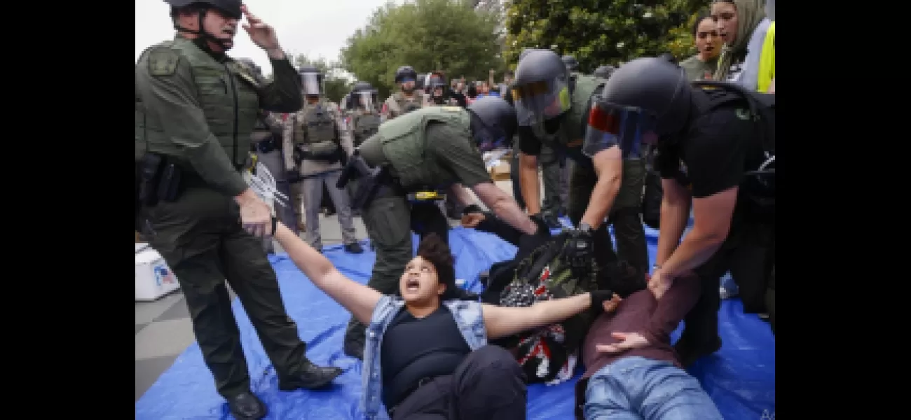 Cops dismantle Palestinian protesters' camp at UCLA.