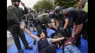 Cops dismantle Palestinian protesters' camp at UCLA.