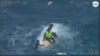 Three individuals saved from capsized boat in Australia.