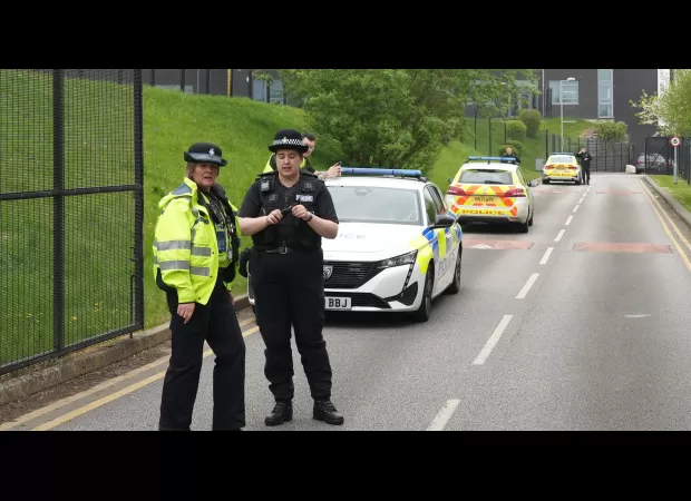 A 17-year-old boy has been arrested and charged for injuring three people with a sharp object in a school attack.