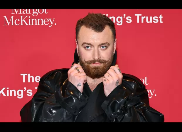 Sam Smith rocks striking fashion statement with bin bag-inspired outfit at Royal event.