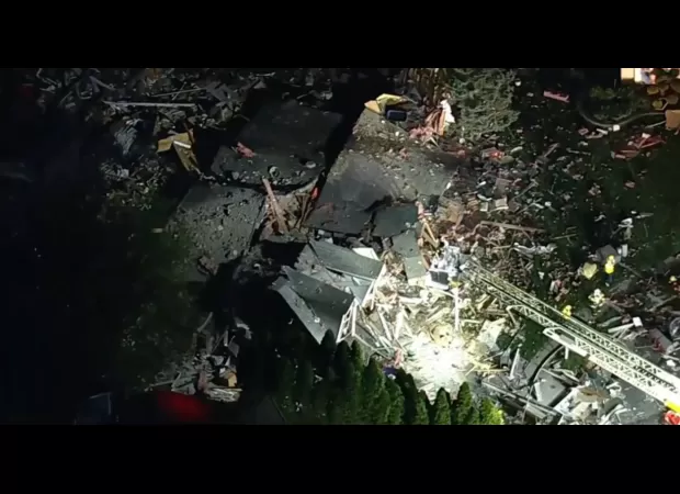 Fatal blast destroys house, claims life, and causes residents to flee their homes.