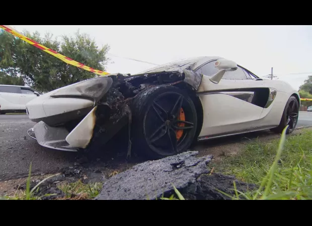 Police are searching for a perpetrator who set fire to a $400,000 McLaren car.