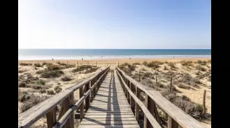 A 40-year-old British man dies after collapsing while taking his dog for a walk on a beach in Spain.