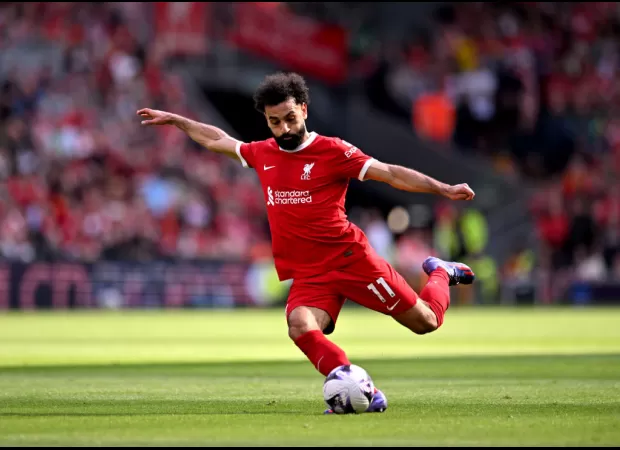 Mohamed Salah, who had an impressive performance, matches Wayne Rooney's record and helps Liverpool defeat Tottenham.