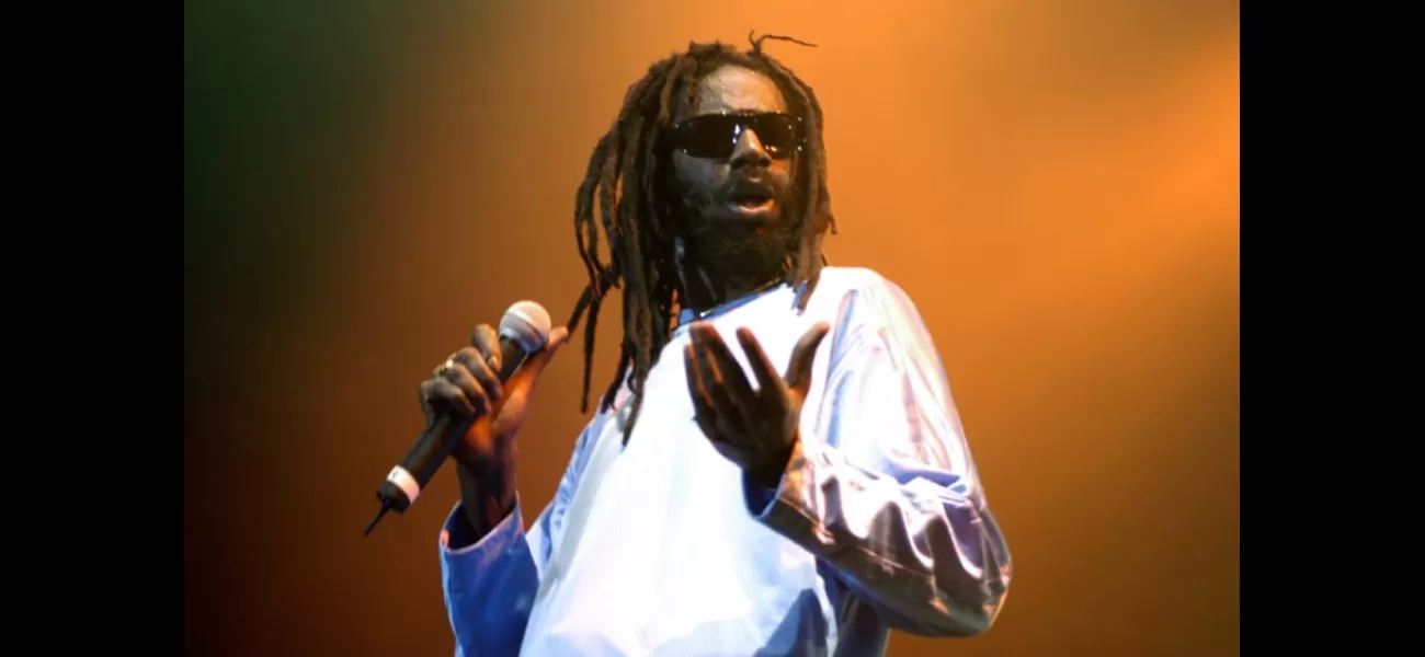 Reggae singer Buju Banton returns to the U.S. with reinstated visa, praising God's goodness.
