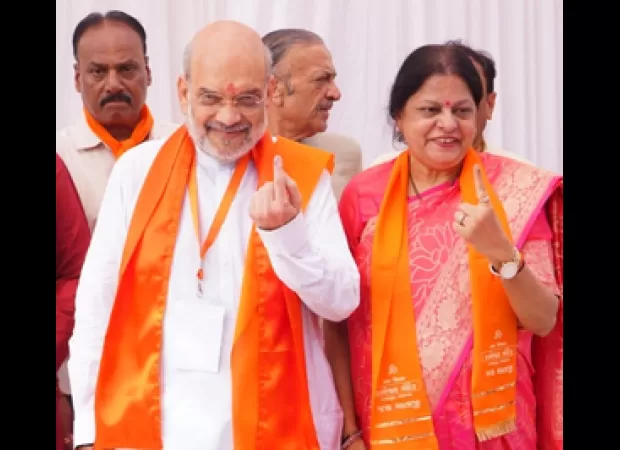 Shah casts vote, encourages people to see voting as responsibility.