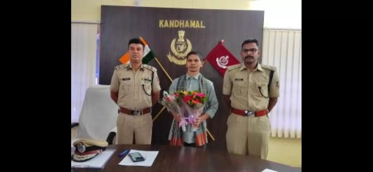A Maoist surrenders to Odisha Police.