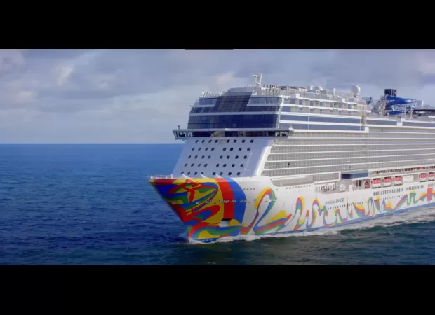 Cruise ship employee charged with attacking three individuals using scissors.