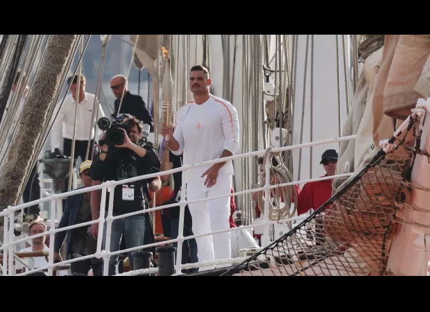 The ship transporting the Olympic torch has reached France.