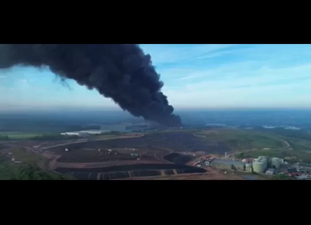 Huge blaze at shopping center, residents told to leave immediately.